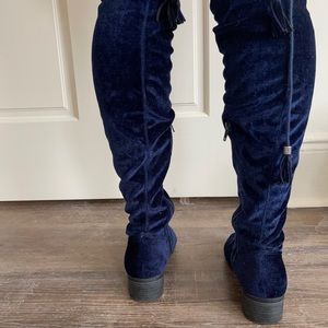 Thigh high dark blue boots